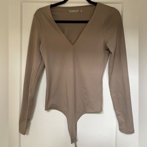 Abercrombie & Fitch long sleeved v-neck body suite. Size small